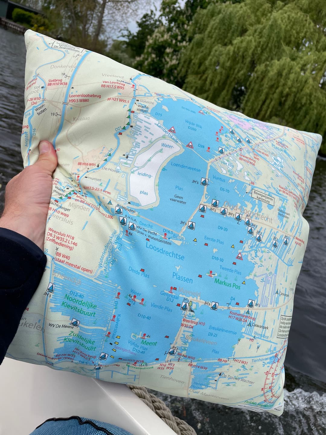 Another example. A map on a cushion in a boat.